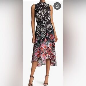 Nanette Lepore Sleeveless Smock
Neck & Waist Hi-Lo Dress